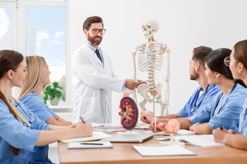 Doctor giving lecture for interns in university