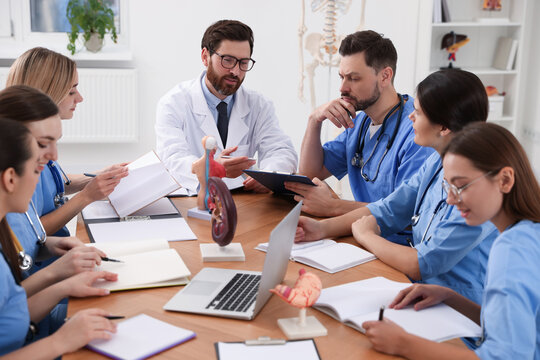 Doctor giving lecture for interns in university