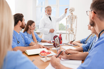 Doctor giving lecture for interns in university