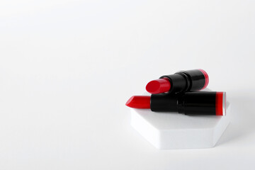 Beautiful lipsticks on white background, space for text