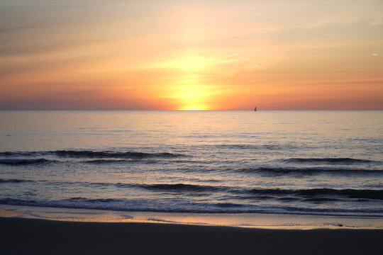 sunset on the beach © edward