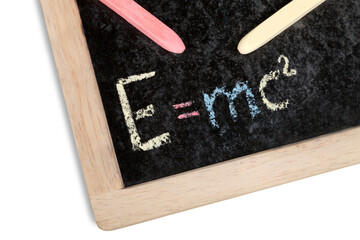 The formula E=mc2 on a chalk blackboard at school