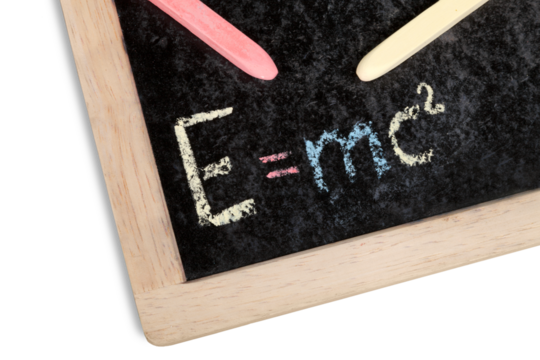 The formula E=mc2 on a chalk blackboard at school