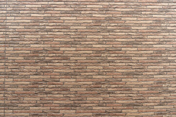 A brick-like wall seen in the city