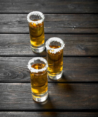 Tequila in a shot glass of salt.