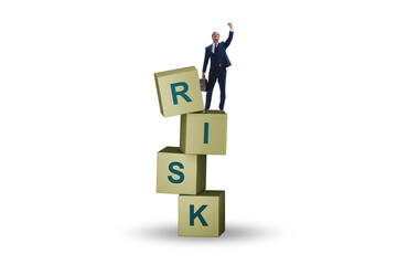 Risk management concept with businessman on cubes