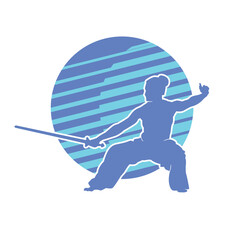 Silhouette of a male martial arts athlete with his hair in a bun. shirtless and holding a sword.
