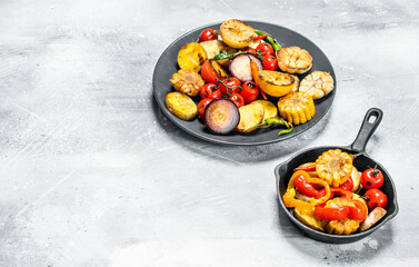Various grilled vegetables with spices and herbs.