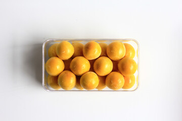 Nastar or Indonesian pineapple tart (bite-size pasty filled with pineapple jam) commonly found when Chinese New Year or Eid Al Fitr or Lebaran, isolated on white background, top view.