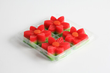 Kue Lapis Bunga or Kue Pepe or sticky layer cake or lapis flower cake, isolated on white...