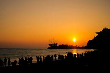 Sunrise view of  sailboat at Jeongdongjin Beach.