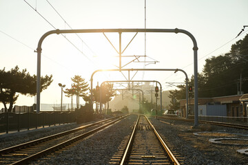 railway crossing with morning sun at South Korea.