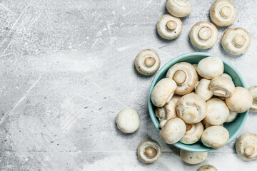 Fresh fragrant mushrooms in bowl.
