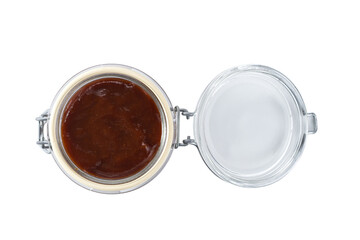 barbecue sauce in a glass jar isolated on white background, top view.