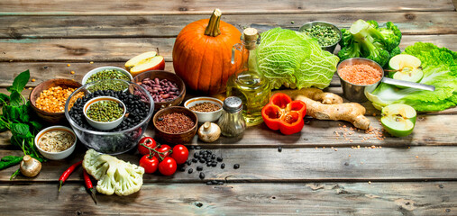 Fototapeta na wymiar Healthy food. Healthy assortment of vegetables and fruits with legumes.
