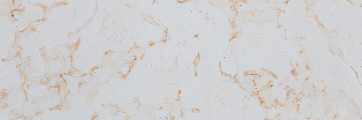 Dolomite texture. Natural rock with beautiful beige patterns on the surface. Polished flat stone. Classic luxury decoration building material. Wide panoramic texture for background and design.