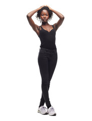 Fototapeta premium Fashion, beauty and portrait of a black woman in a studio with a casual outfit, confidence and natural pose. Beauty, young and African female model with afro posing while isolated by white background