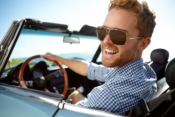 Car road trip, travel and portrait man on holiday adventure, happy transportation journey or fun summer vacation. Flare, sunglasses and driver driving convertible vehicle on Canada countryside tour - obrazy, fototapety, plakaty