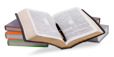 Obraz premium Opened Book on stack books With Pen