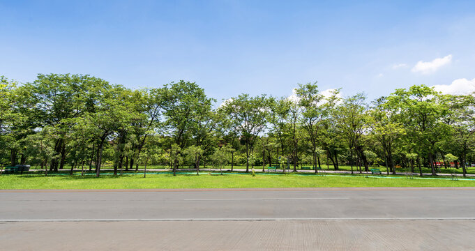 Empty highway-country road and beautiful sky in green park