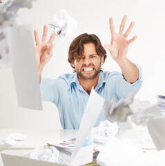 Angry, stress and businessman throw crumpled paper for brainstorming, thinking of ideas and strategy. Corporate worker, burnout and frustrated employee with mess of documents, paperwork and notes