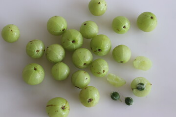 Amla or Indian Gooseberries are small, nutritious fruits produced from gooseberry tree