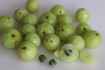 Amla or Indian Gooseberries are small, nutritious fruits produced from gooseberry tree