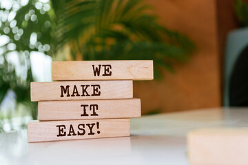 Wooden blocks with words 'We make it easy'.