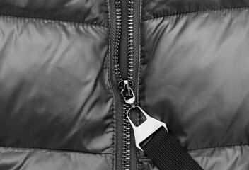 Zipper on the winter jacket. Close up.