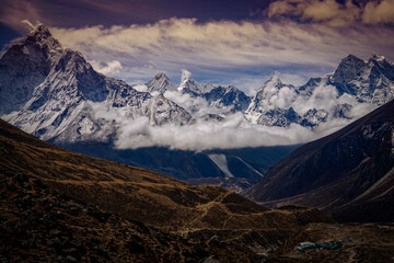Beautiful mountain range covered by cloud along the way to EBC (Nepal, Himalaya)