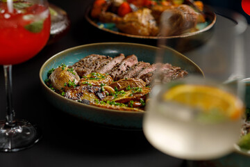 Served with food and drinks table in restaurant, nobody