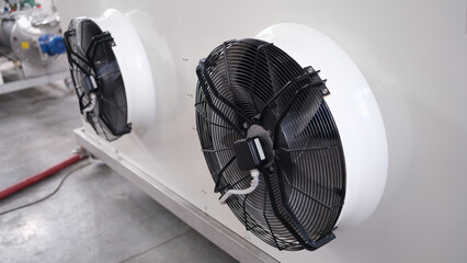 Cooling industrial air conditioners and fans closeup.