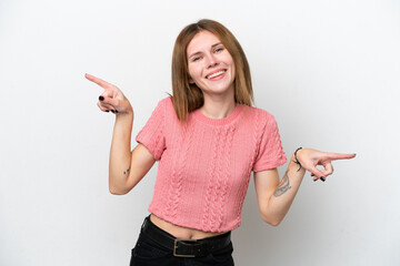 Young English woman isolated on white background pointing finger to the laterals and happy