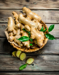 Fragrant ginger with leaves in the basket.
