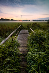 Bridge at the countryside during sunrise - 561219118