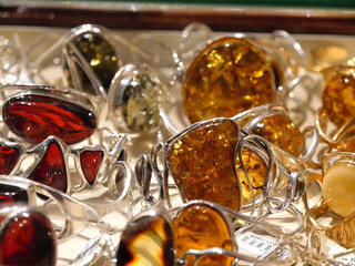 Amber jewelry on a wall in Sukiennice clothes hall in Krakow