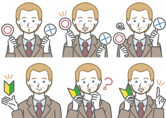 〇✕マークや初心者マークを持つ、スーツを着た中年の白人男性