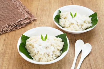 Ketan Kelapa Parut, Indonesian traditional snack, made from steamed glutinous rice and served with grated coconut
