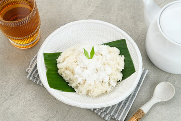 Ketan Kelapa Parut, Indonesian traditional snack, made from steamed glutinous rice and served with grated coconut
