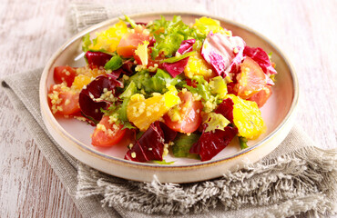 Healthy vitamin colorful salad with orange and couscous