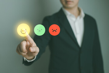 User give rating to service experience on online application for Customer review satisfaction feedback survey concept.