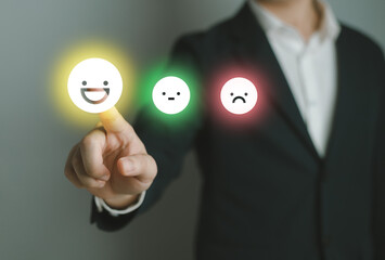 Hand of client show a feedback with smiley face. Service rating, satisfaction concept