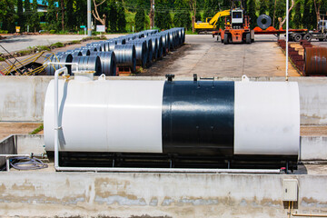 Fototapeta na wymiar Storage tank white one of fuel oil in the horizontal tanks