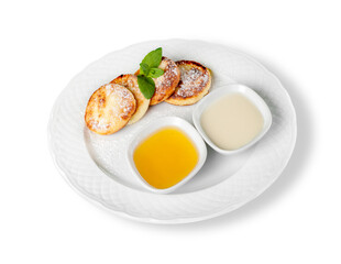 Cheese pancake with sauce cream on plate