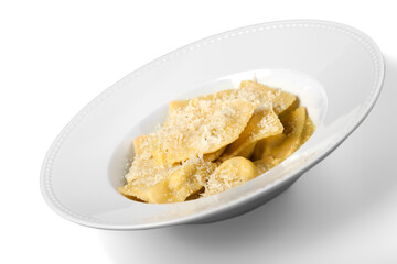 Close-up of tasty pasta with Parmesan  in white plate isolated on white background