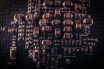 A picture of SMT electronic components on a printed circuit board, showing the need for maintenance as they are covered in dust - 561231355