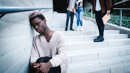 Black transgender student near bullies