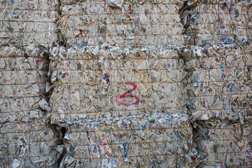 Paper pile and piece of cardboard