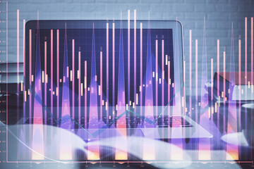 Forex market graph hologram and personal computer on background. Multi exposure. Concept of investment.