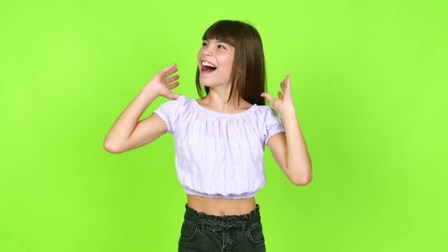 Little girl with surprise and shocked facial expression over isolated background